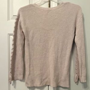 Small tied sweater